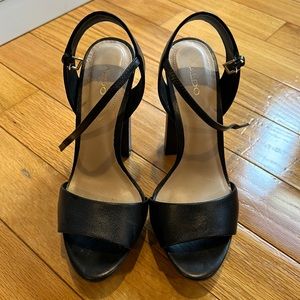 Hot black heels on a platform